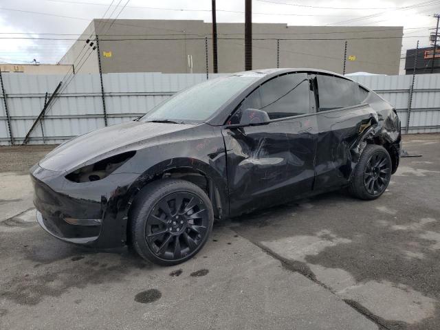 TESLA MODEL Y 2024 with VIN 7SAYGDEE2RA220295 - Photo from auction