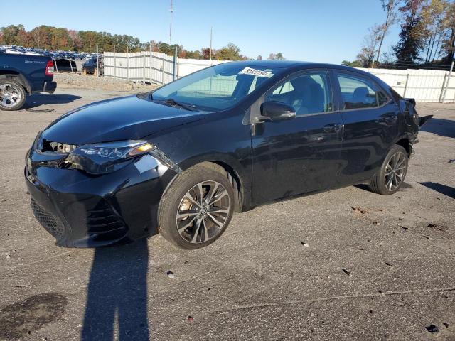 TOYOTA COROLLA L 2017 with VIN 5YFBURHE4HP681251 - Photo from auction