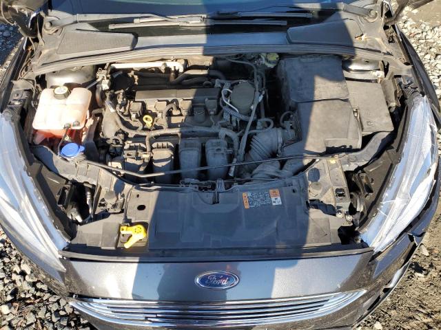 Photo 11 from auction – 2016 FORD FOCUS TITA with VIN 1FADP3J25GL309301