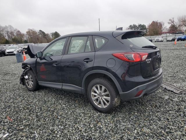 Photo 2 from auction – 2015 MAZDA CX-5 SPORT with VIN JM3KE2BE3F0514925