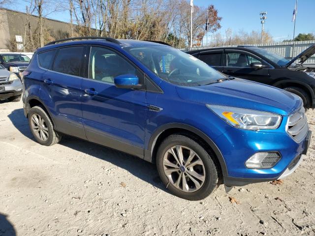Photo 4 from auction – 2017 FORD ESCAPE SE with VIN 1FMCU9GD6HUC75158