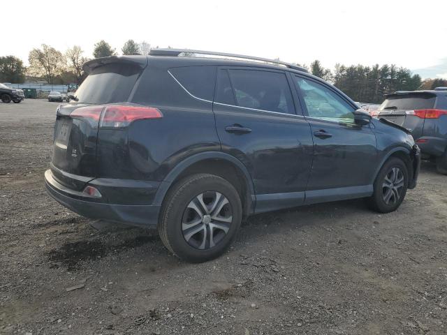 Photo 3 from auction – 2018 TOYOTA RAV4 LE with VIN 2T3BFREV4JW721211