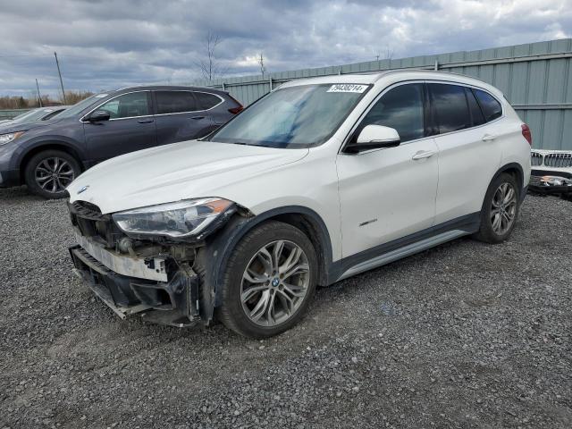 BMW X1 XDRIVE2 2016 with VIN WBXHT3C3XG5E56883 - Photo from auction