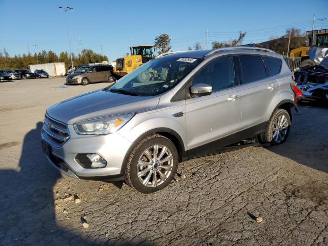 FORD ESCAPE TIT 2017 with VIN 1FMCU0J95HUA64291 - Photo from auction