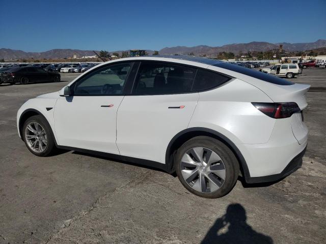 Photo 2 from auction – 2023 TESLA MODEL Y with VIN 7SAYGDED6PF970077