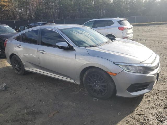 Photo 4 from auction – 2017 HONDA CIVIC LX with VIN 2HGFC2F57HH566441
