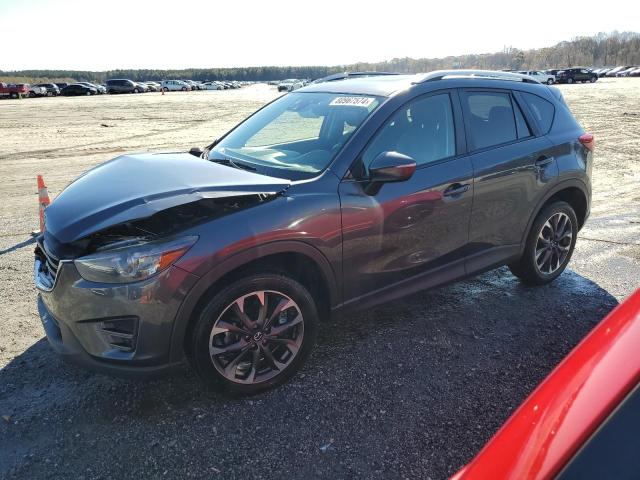 MAZDA CX-5 GT 2016 with VIN JM3KE4DY6G0789077 - Photo from auction