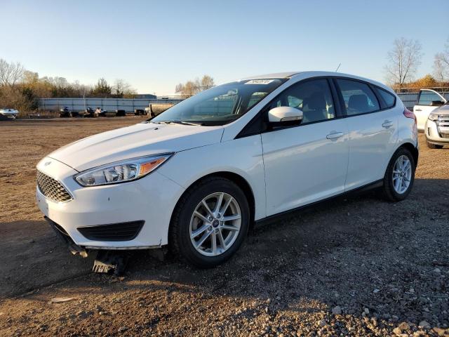 FORD FOCUS SE 2015 with VIN 1FADP3K23FL242047 - Photo from auction