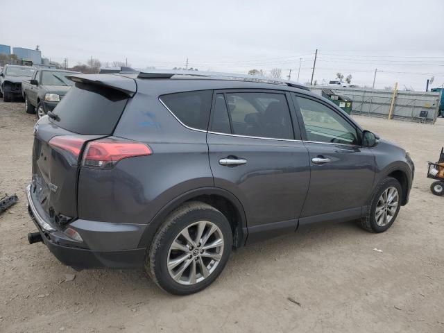 Photo 3 from auction – 2018 TOYOTA RAV4 LIMIT with VIN JTMDFREV7JD239712