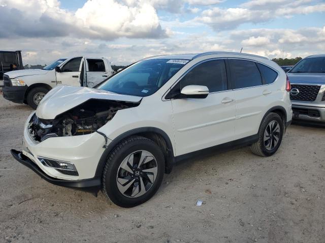 HONDA CR-V TOURI 2015 with VIN 5J6RM3H90FL007516 - Photo from auction