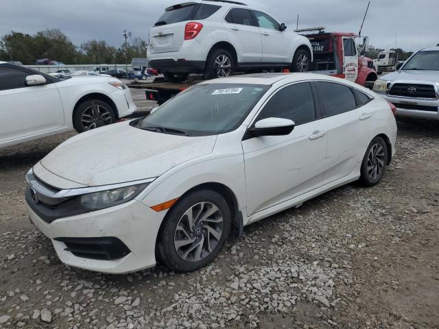Photo 1 from auction – 2018 HONDA CIVIC EX with VIN 19XFC2F74JE015062