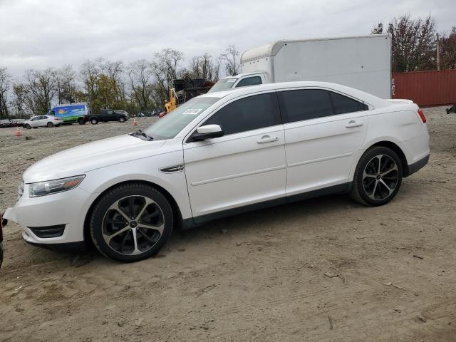 FORD TAURUS SEL 2015 with VIN 1FAHP2E8XFG147943 - Photo from auction