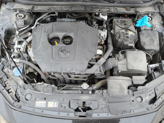 Photo 11 from auction – 2024 MAZDA 3 PREMIUM with VIN JM1BPAMM9R1704759