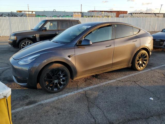 TESLA MODEL Y 2023 with VIN 7SAYGAEE6PF598358 - Photo from auction