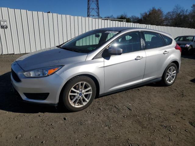FORD FOCUS SE 2018 with VIN 1FADP3K28JL206041 - Photo from auction