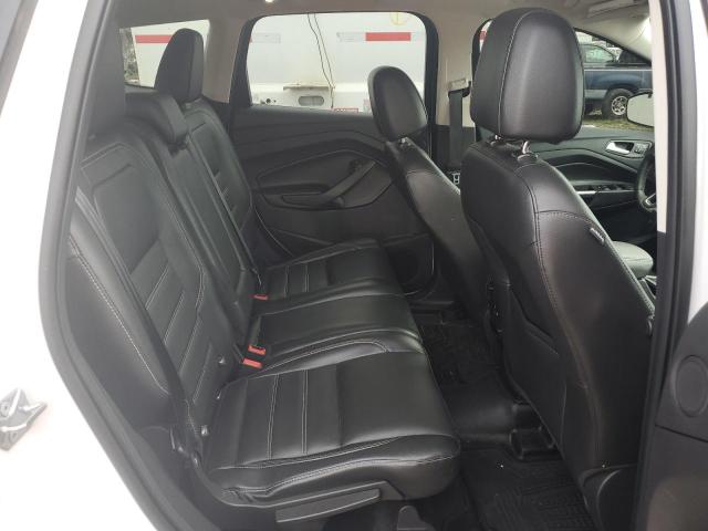 Photo 11 from auction – 2017 FORD ESCAPE TIT with VIN 1FMCU9J9XHUD02060