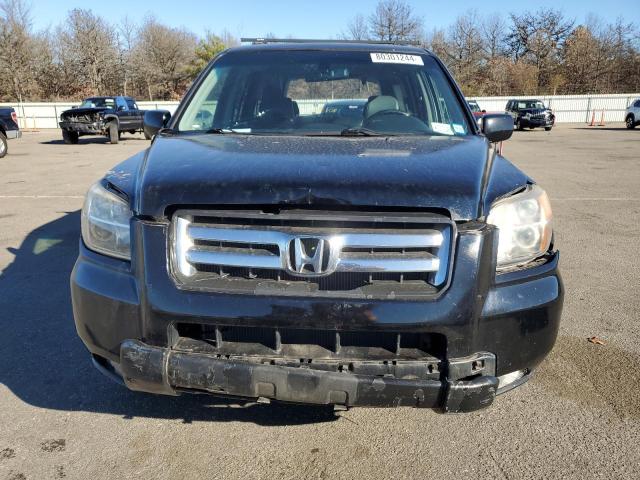 Photo 5 from auction – 2006 HONDA PILOT with VIN 2HKYF18546H513223