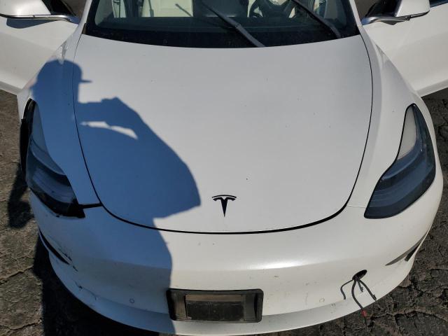 Photo 11 from auction – 2018 TESLA MODEL 3 with VIN 5YJ3E1EB1JF112209