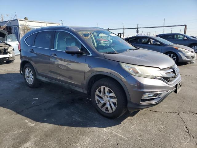 Photo 4 from auction – 2015 HONDA CR-V EXL with VIN 2HKRM3H75FH503193