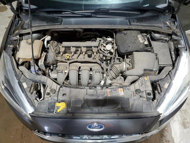 Photo 11 from auction – 2016 FORD FOCUS SE with VIN 1FADP3F21GL352803