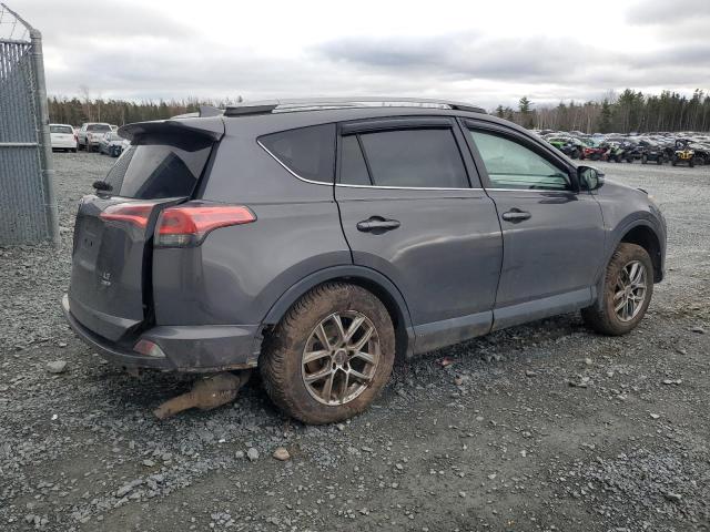 Photo 3 from auction – 2017 TOYOTA RAV4 LE with VIN 2T3BFREV0HW563279