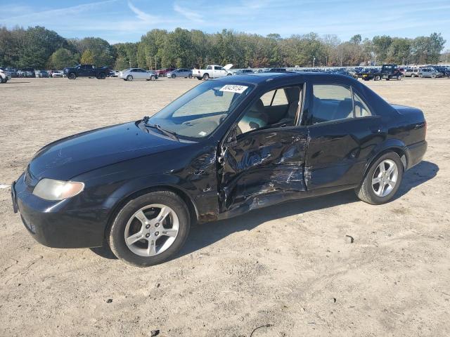 MAZDA PROTEGE DX 2003 with VIN JM1BJ225130136460 - Photo from auction