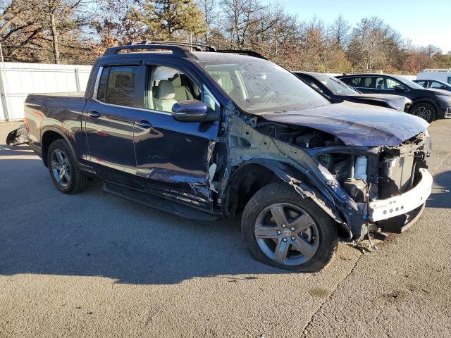 Photo 4 from auction – 2023 HONDA RIDGELINE with VIN 5FPYK3F58PB031792