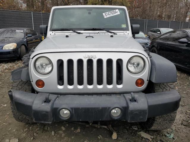 Photo 5 from auction – 2011 JEEP WRANGLER U with VIN 1J4HA3H10BL637447
