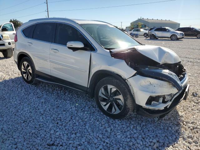 Photo 4 from auction – 2016 HONDA CR-V TOURI with VIN 5J6RM3H96GL014391