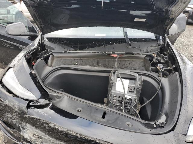 Photo 12 from auction – 2022 TESLA MODEL Y with VIN 7SAYGDEE5NF400948
