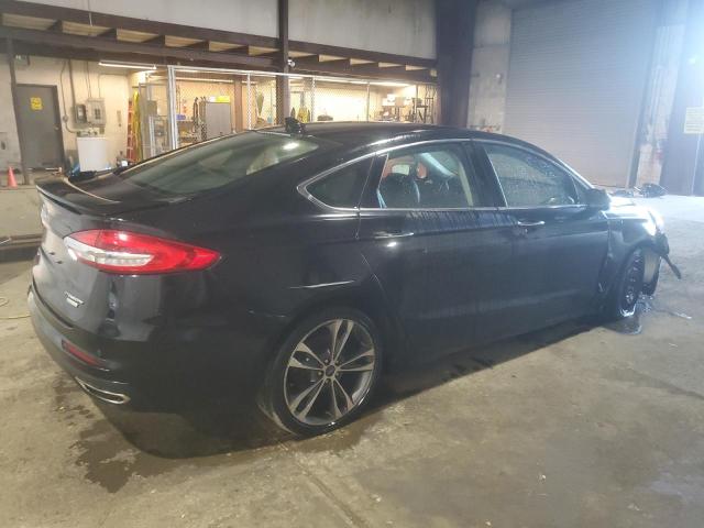 Photo 3 from auction – 2019 FORD FUSION TIT with VIN 3FA6P0K91KR217292