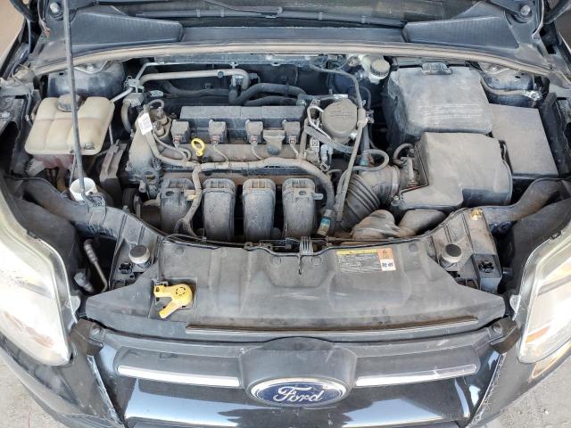 Photo 11 from auction – 2014 FORD FOCUS SE with VIN 1FADP3K28EL139947