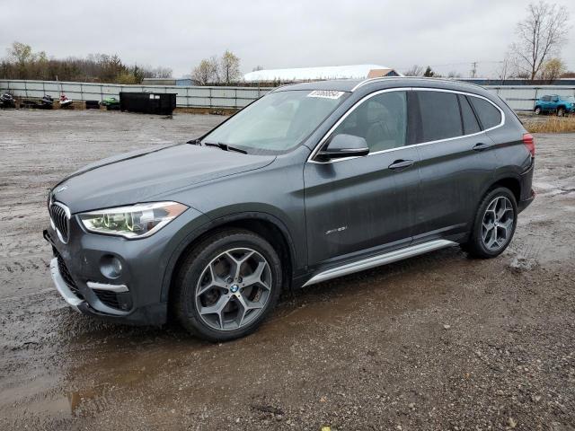 BMW X1 XDRIVE2 2017 with VIN WBXHT3C37H5F76125 - Photo from auction