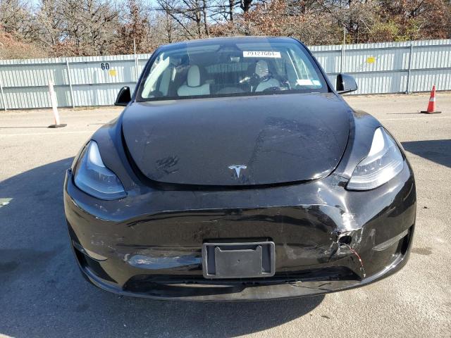 Photo 5 from auction – 2023 TESLA MODEL Y with VIN 7SAYGDEE3PA197087