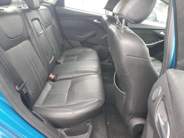 Photo 10 from auction – 2013 FORD FOCUS TITA with VIN 1FADP3J28DL301270