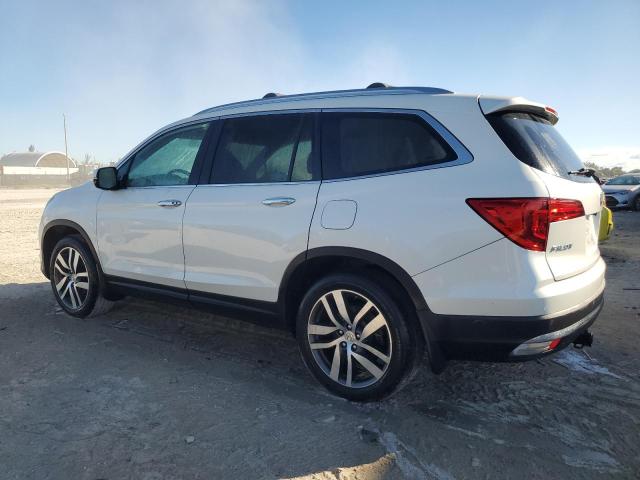 Photo 2 from auction – 2016 HONDA PILOT TOUR with VIN 5FNYF6H96GB040196