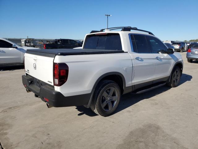 Photo 3 from auction – 2023 HONDA RIDGELINE with VIN 5FPYK3F71PB031909