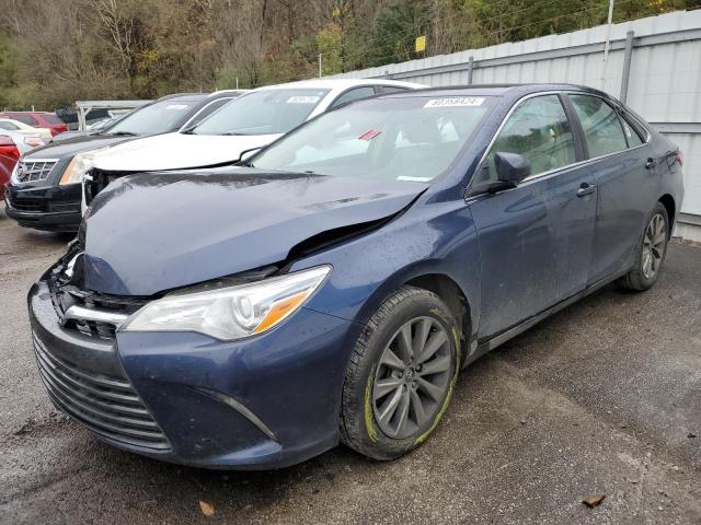 TOYOTA CAMRY LE 2017 with VIN 4T1BF1FK9HU666408 - Photo from auction