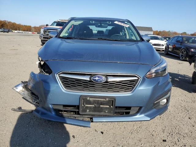 Photo 5 from auction – 2018 SUBARU IMPREZA LI with VIN 4S3GKAU6XJ3611232