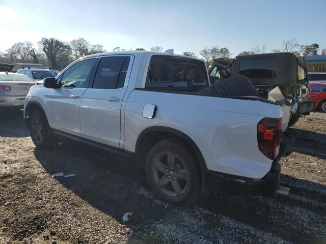 Photo 2 from auction – 2023 HONDA RIDGELINE with VIN 5FPYK3F56PB055086