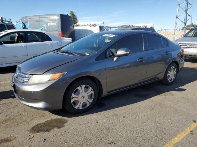 HONDA CIVIC HYBR 2012 with VIN JHMFB4F23CS005284 - Photo from auction