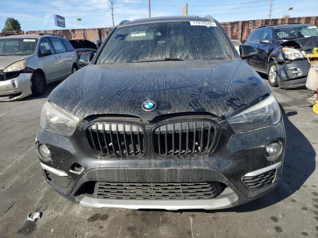Photo 5 from auction – 2016 BMW X1 XDRIVE2 with VIN WBXHT3C35G5E56709