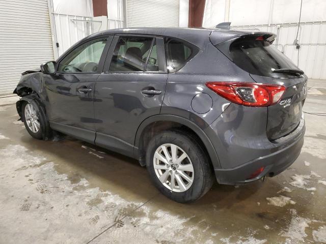 Photo 2 from auction – 2014 MAZDA CX-5 TOURI with VIN JM3KE4CY9E0382921