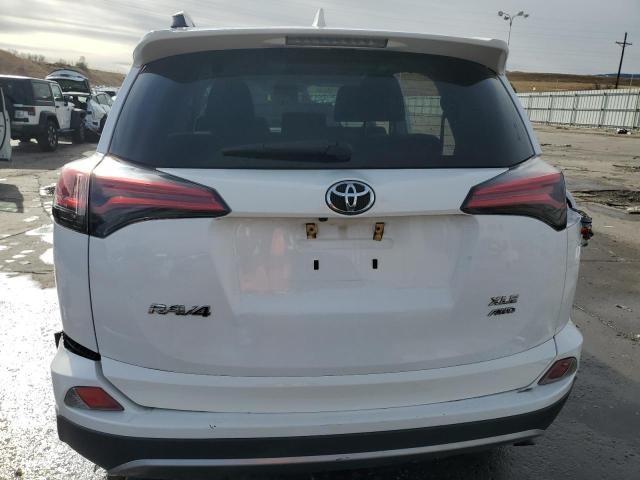 Photo 6 from auction – 2017 TOYOTA RAV4 XLE with VIN 2T3RFREV8HW600772