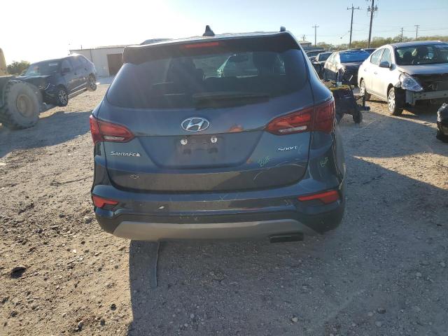 Photo 6 from auction – 2017 HYUNDAI SANTA FE S with VIN 5NMZU3LBXHH020553