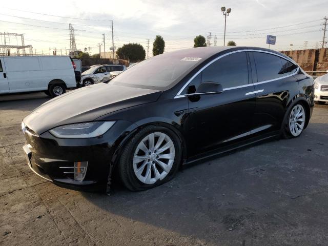 TESLA MODEL X 2018 with VIN 5YJXCAE24JF103883 - Photo from auction