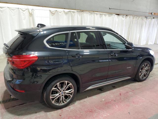Photo 3 from auction – 2017 BMW X1 XDRIVE2 with VIN WBXHT3Z35H4A55644