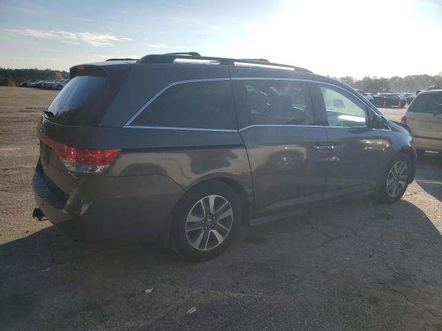 Photo 3 from auction – 2014 HONDA ODYSSEY TO with VIN 5FNRL5H99EB040147