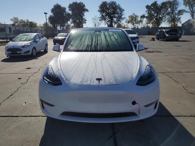 Photo 5 from auction – 2023 TESLA MODEL Y with VIN 7SAYGDEE6PF697828