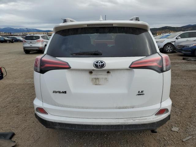 Photo 6 from auction – 2017 TOYOTA RAV4 LE with VIN 2T3BFREV7HW693611